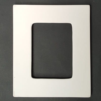 Bisque Picture Frame 20.7cm tall, 17.8cm wide and 1cm thick.
