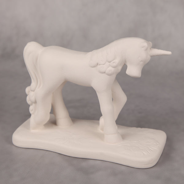 Bisque Star The Unicorn 18.5cm long by 14cm tall