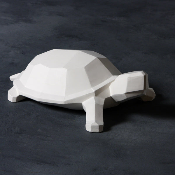 Bisque Faceted Turtle 9cm tall by 27cm long and 16.5cm wide.